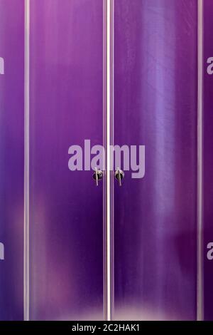 Closed Double Purple Glass Door at Shower Cabin Stock Photo