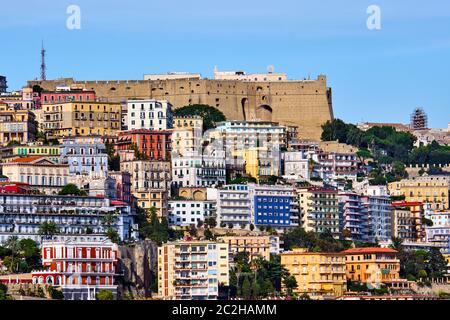 Castel Sant Elmo and the colorful apartment houses of Vomero in Naples, Italy Stock Photo