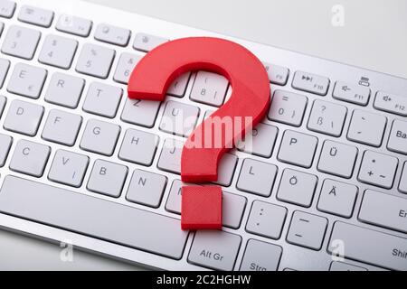Photo Of Red Question Mark On Computer Keyboard Stock Photo