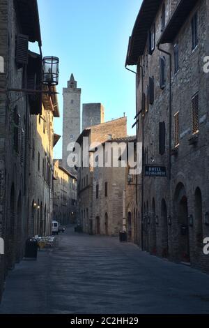 San Gimignano Tuscany Italy. View from the main street of the medieval city in early morning. Stock Photo