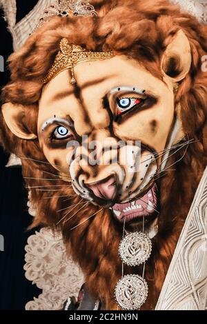 Kolkata India October 2018 - Close up portrait of Screaming horror face of King Bengal Tiger Head. Ghost cruel, Scary halloween shot in Durga Puja fes Stock Photo