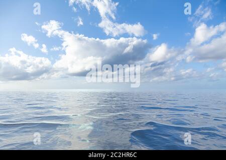 blue sky with white clouds over the sea Stock Photo