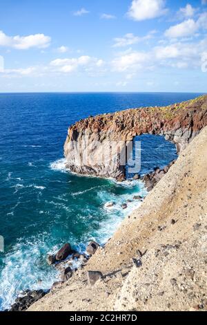 rock arch Punta Perciato Stock Photo