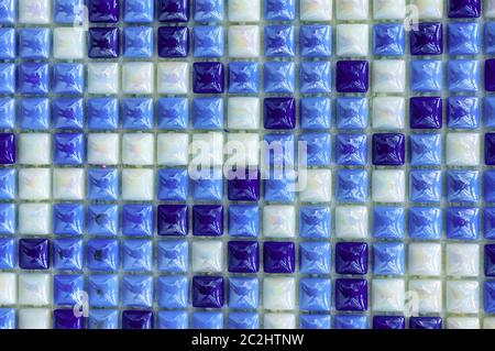 Background of bright mosaic tiles in a bold pattern. Abstract ceramic for print design. White texture. Ceramic floor tiles. Grap Stock Photo