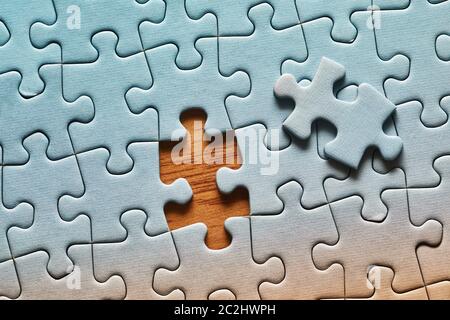 Jigsaw puzzle background, one last piece missing only, easy task Stock Photo