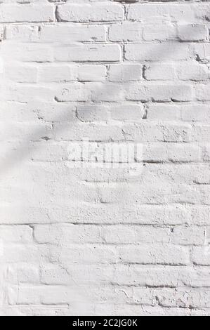 Abstract weathered texture stained old stucco light gray and aged paint white brick wall background in rural room, grungy rusty Stock Photo
