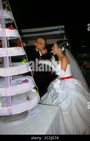 Turkey Muslim Wedding Groom Feeding Cake to Bride Stock Photo