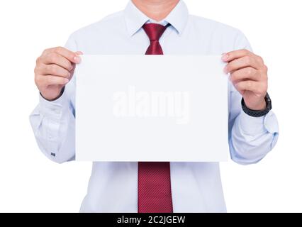 Handsome young business man showing blank paper on chest. Ready for text message Stock Photo