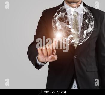 Businessman finger touching map point, international meaning, network connection, with copy space on gray background Stock Photo