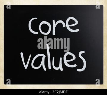 Ethics concept - core values handwritten with white chalk on a blackboard Stock Photo