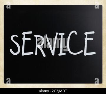 "Service" handwritten with white chalk on a blackboard Stock Photo