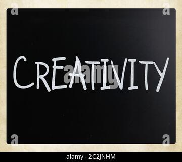 The word "Creativity" handwritten with white chalk on a blackboard Stock Photo
