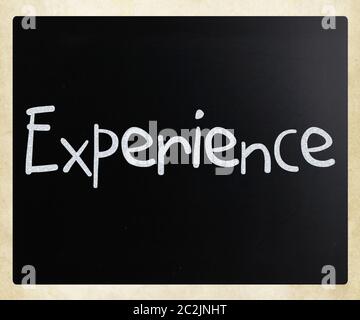 The word "Experience" handwritten with white chalk on a blackboard Stock Photo