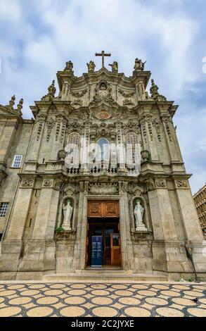 Igreja do Carmo Church of Carmelites built in 18th century with ornate tiled side facade decorated with Portuguese azulejo tiles in Porto, Portugal Stock Photo