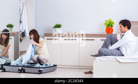 The wife seeing her husband off to business trip Stock Photo