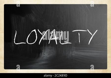 text handwritten with white chalk on a blackboard Stock Photo
