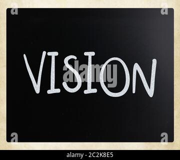 Vision handwritten with white chalk on a blackboard Stock Photo