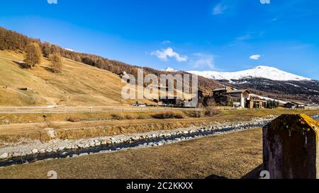 https://l450v.alamy.com/450v/2c2kkxx/beautiful-mountain-valley-with-stream-trees-wooden-fence-and-footpath-livingo-village-in-background-italy-alps-2c2kkxx.jpg