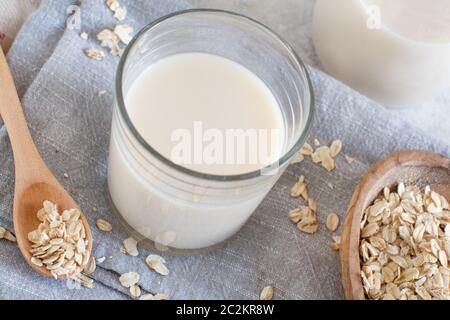 Vegan oat milk, non dairy alternative milk in a glass close up Stock Photo