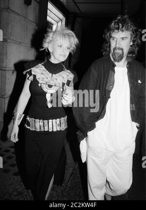 LONDON, UK. c. 1986: Actor/comedian Billy Connolly & wife Pamela Stephenson at party at Langan's Brasserie in London. © Paul Smith/Featureflash Stock Photo