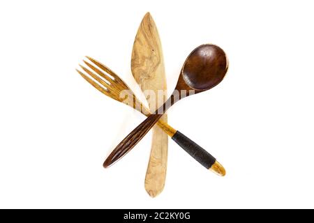 Wooden knife, fork and spoon on white background Stock Photo