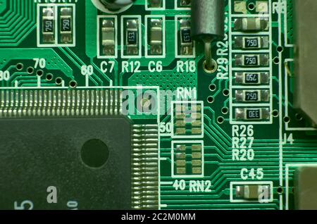 contacts and electronic circuits printed with various components and microprocessors: excellent texture for graphic projects. Stock Photo