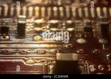 Texture or background created with electronic elements coming from an electronic board with printed circuit boards. Stock Photo