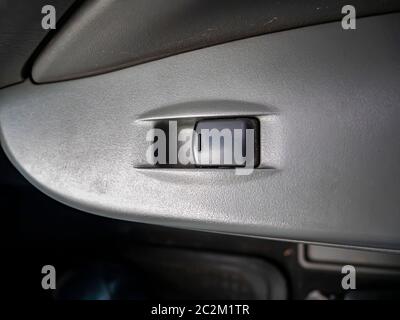 Power window button of a car. Place for text. Transport. Stock Photo