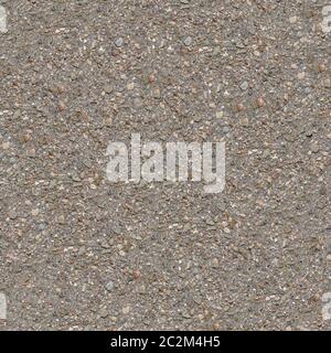 Seamless Tileable Texture of Old Asphalt Road with Protruding Stones. Stock Photo