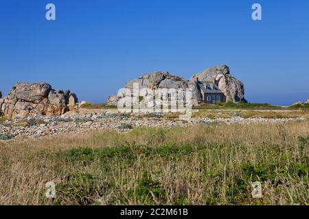 famous house on the rocks at ploumenach, cote de granit rose, cotes d'armor brittany, france Stock Photo