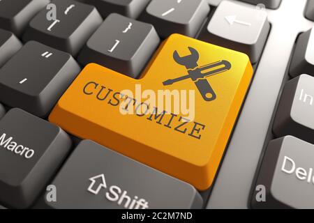 Orange Button with Customize on Black Computer Keyboard. Business Concept. Stock Photo