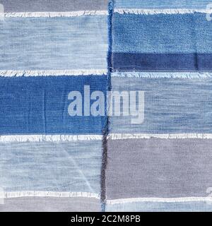 textile square background - patchwork from various denim flaps Stock Photo