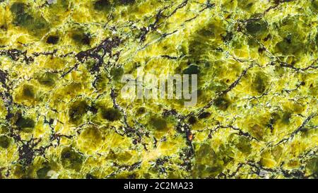 panoramic background from polished natural Serpentinite (Lizardite) rock close up Stock Photo