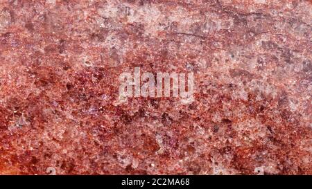 panoramic background from polished natural red brown Aventurine rock close up Stock Photo