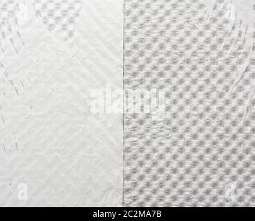 fragment of white tattered wrapping paper, full frame, close up Stock Photo