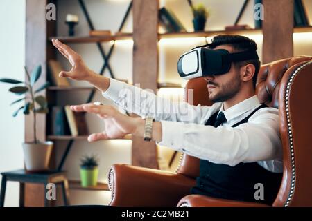 Man wearing virtual reality goggles Stock Photo
