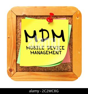 MDM - Mobile Device Management - Written on Yellow Sticker on Cork Bulletin or Message Board. Stock Photo