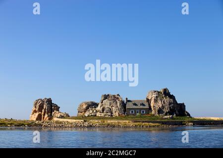 famous house on the rocks at ploumenach, cote de granit rose, cotes d'armor brittany, france Stock Photo