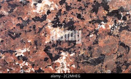 panoramic background from polished natural Urtite rock close up Stock Photo