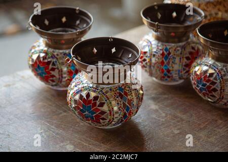 Turkish handmade symbolic ceramic cups on wooden background. Ceramic traditional turkish souvenir pots at Grand bazaar, istanbul Stock Photo
