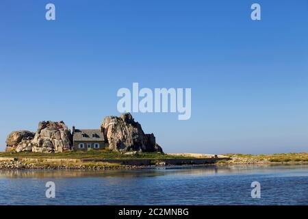 famous house on the rocks at ploumenach, cote de granit rose, cotes d'armor brittany, france Stock Photo