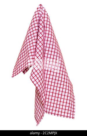 Towels isolated. Closeup of a red and white checkered napkin or tablecloth texture isolated on white background. Kitchen accessories. Macro photograph Stock Photo