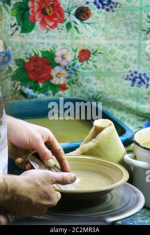 Pottery making process. Ceramic from clay. Potter in work. Art of pottery Stock Photo