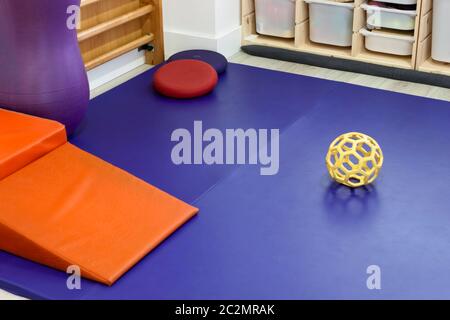 Pad and equipment for rehabilitation in a kids physiotherapy clinic. Stock Photo