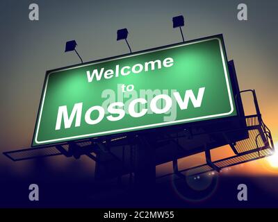 Welcome to Moscow - Green Billboard on the Rising Sun Background. Stock Photo