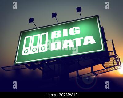 Big Data with Folders Icon - Green Billboard on the Rising Sun Background. Stock Photo