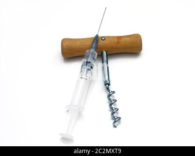 Syringe and corkscrew Stock Photo