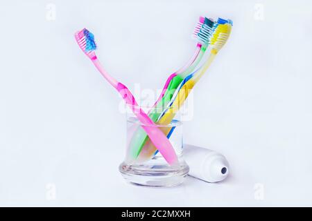 Healthy, well-kept teeth by brushing with toothbrushes and toothpaste Stock Photo