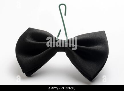 Black bow tie with hook for Christmas decorations Stock Photo