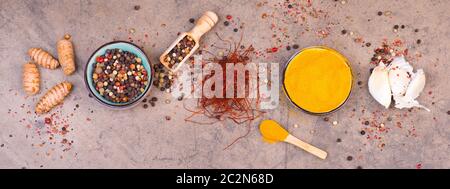 Spices on a brown textured background Stock Photo